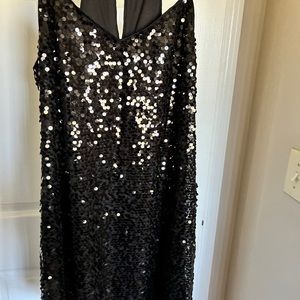 Black mini sequined dress.
